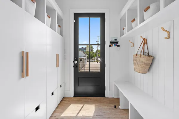 a view of walk in closet with clothes