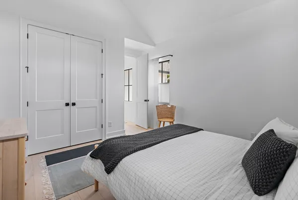 a large kitchen with stainless steel appliances granite countertop a stove a sink and a refrigerator