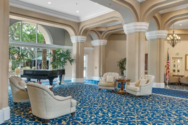 a view of a living room and dining room