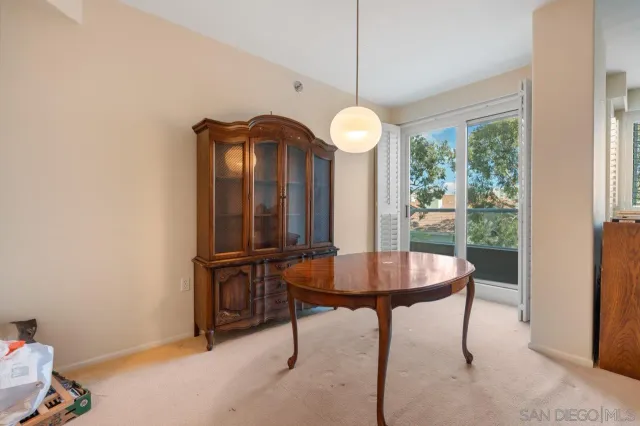 a view of a livingroom with furniture and window