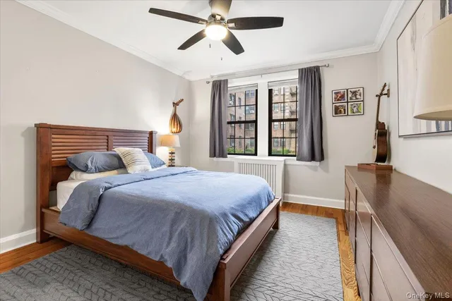 a bedroom with bed and window