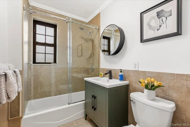 a bathroom with a toilet a sink and a bathtub