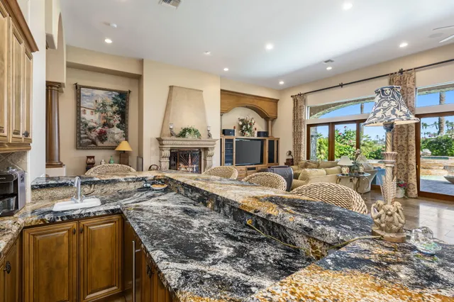 a very nice looking kitchen with a large window