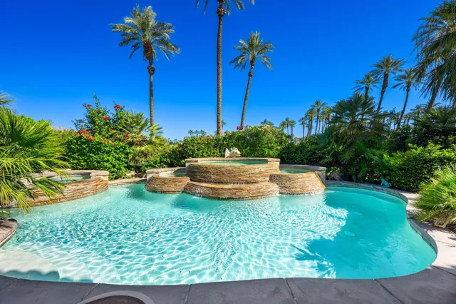 a view of a backyard with a house