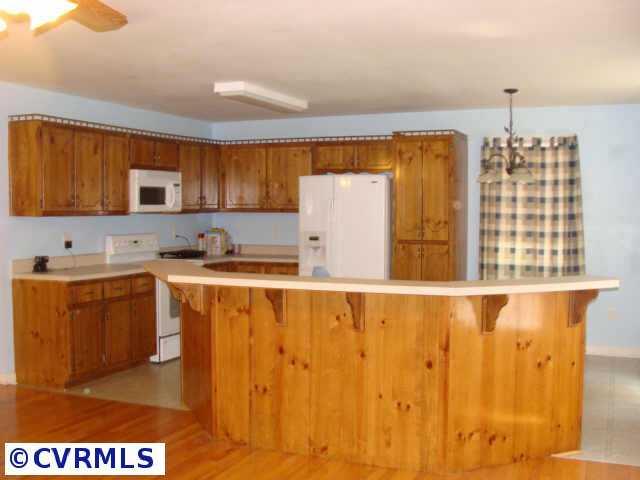 9108 Squirrel Level Road Petersburg, VA 23803 - Photo 3 of 6 Other - Open Kitchen with Angled Breakfast Bar