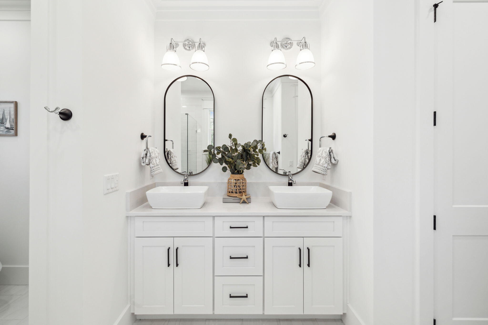 200 Grayton Boulevard Santa Rosa Beach, FL 32459 - Photo 19 of 55 a bathroom with a double vanity sink mirror and