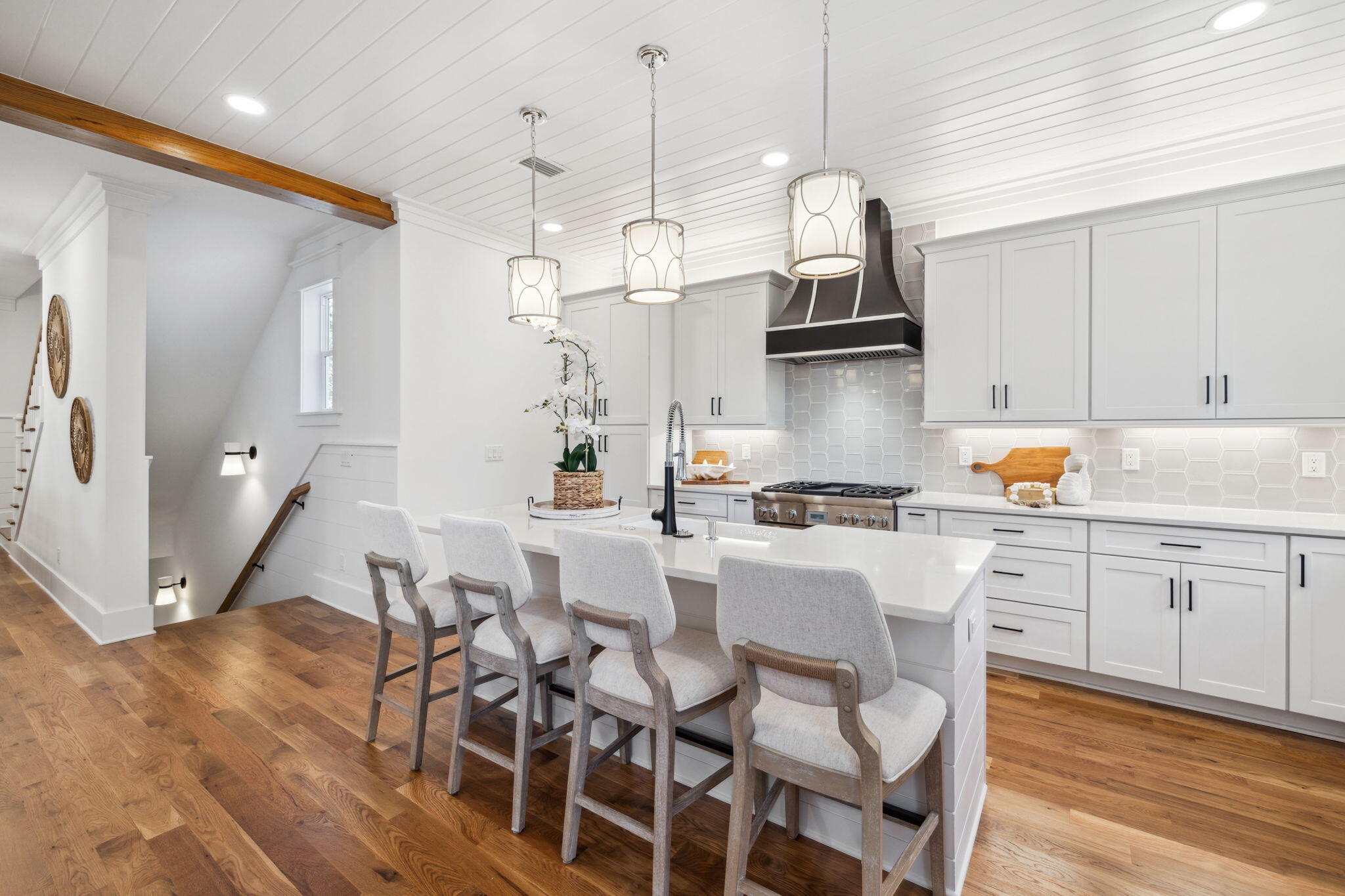 200 Grayton Boulevard Santa Rosa Beach, FL 32459 - Photo 22 of 55 a kitchen with stainless steel appliances granite countertop a stove a sink dishwasher and a refrigerator with wooden floor
