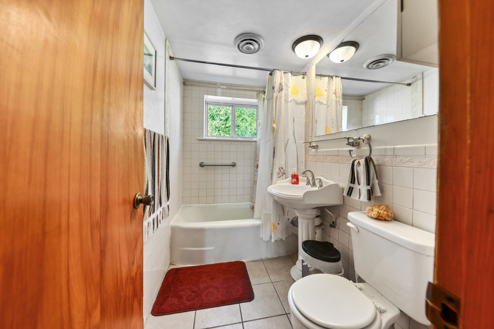 605 East Street Mazon, IL 60444 - Photo 11 of 28 a bathroom with a sink toilet and shower