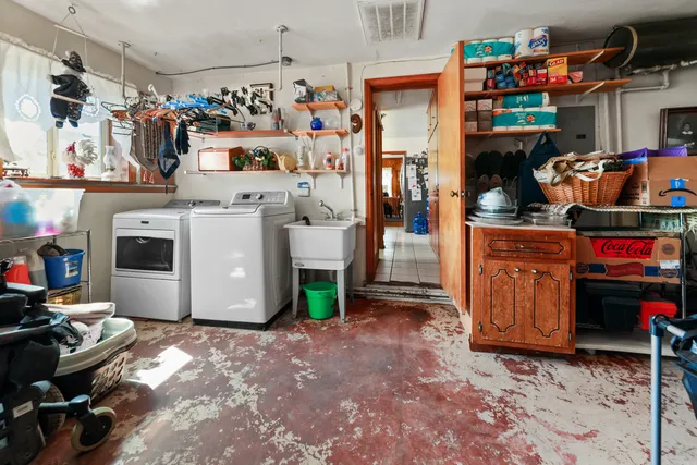 a storage room with washer and dryer