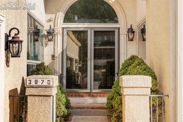 a sign board with a street sign on the wall