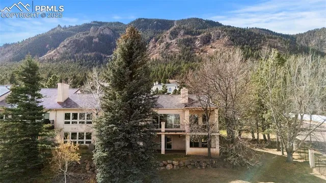 a view of a house with a mountain