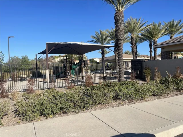 a view of a park with a patio