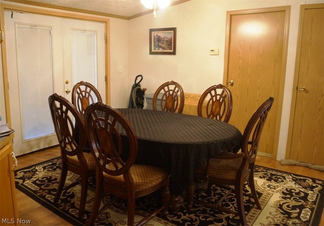 71 Skeleton Road Northwest Dellroy, OH 44620 - Photo 3 of 13 PLENTY OF ROOM IN YOUR FORMAL DINING , WALK OUT ON TO YOUR VERY OWN DECK AND ENJOY WHAT NATURE HAS TO OFFER!