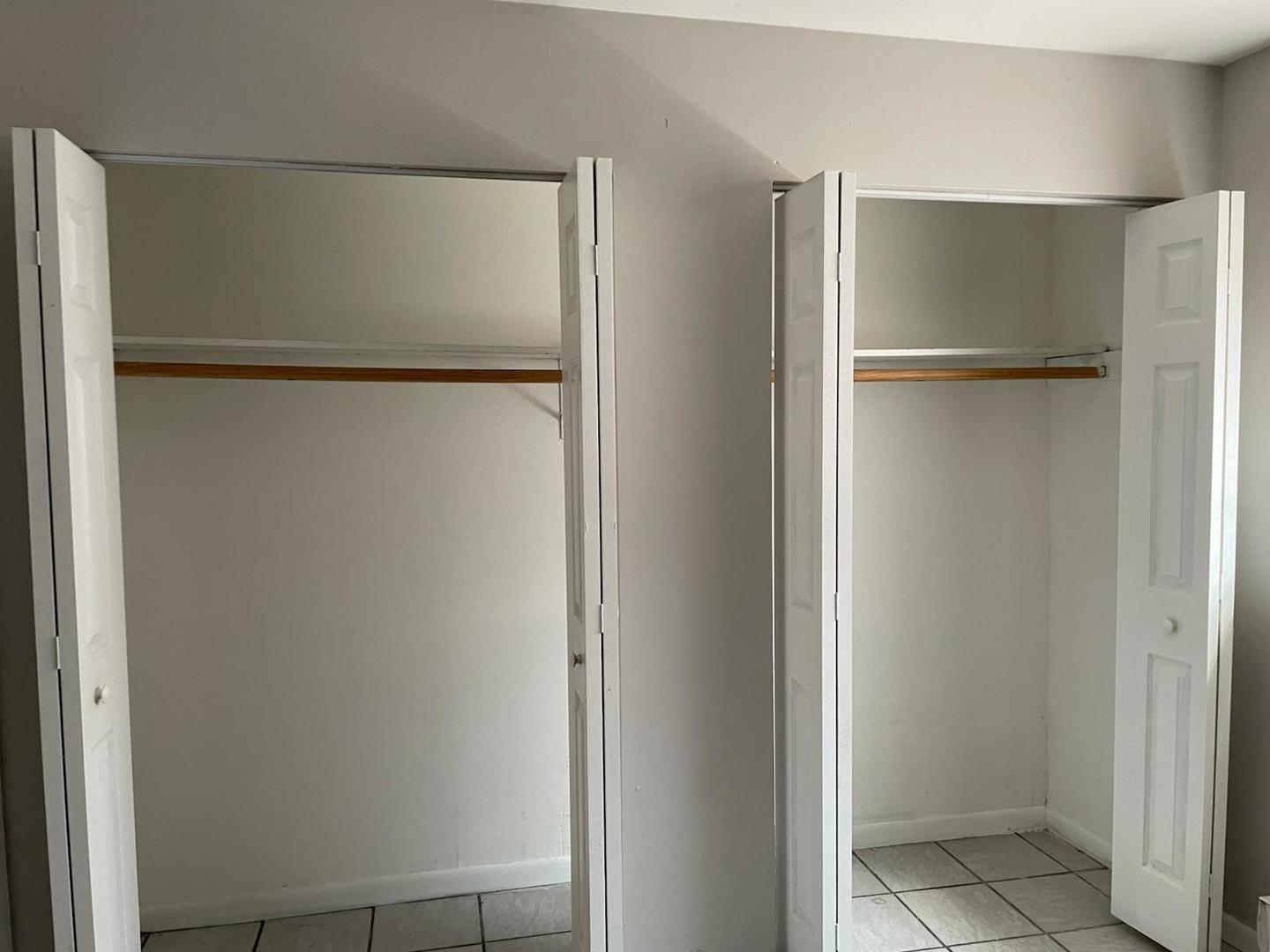 1751 Felten Road, Unit 1 Aurora, IL 60505 - Photo 13 of 19 a view of walk in closet with empty racks