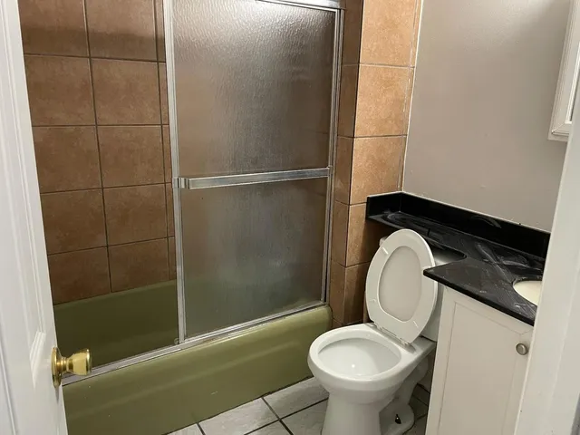a bathroom with a toilet and a sink