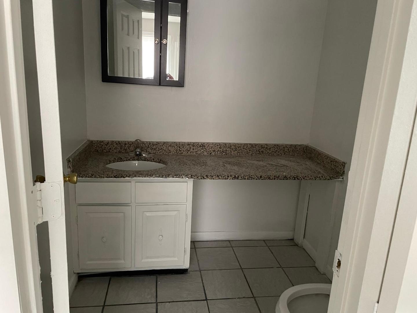 1751 Felten Road, Unit 1 Aurora, IL 60505 - Photo 8 of 19 a kitchen with a sink