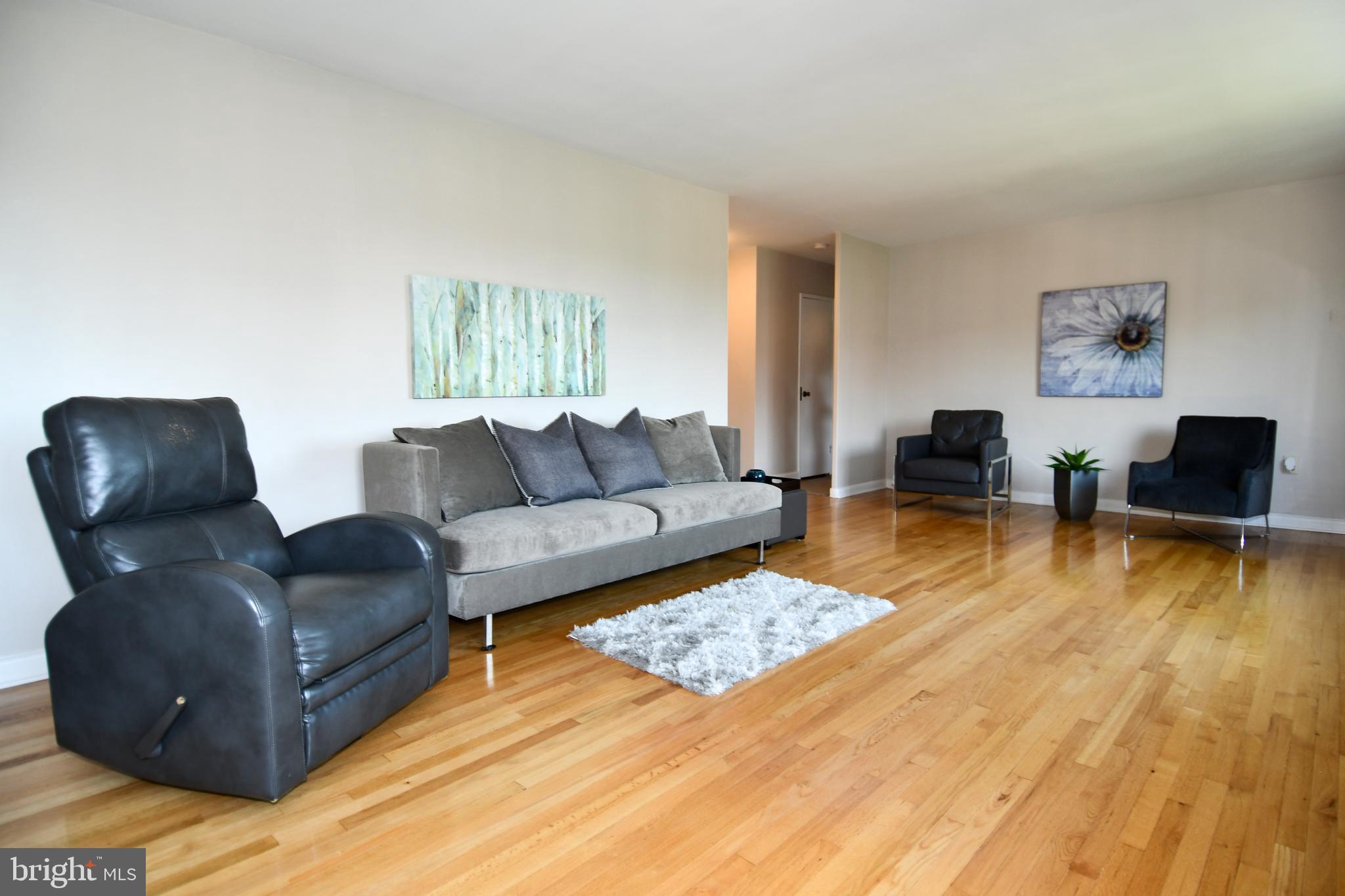 1200 South Arlington Ridge Road, Unit 704 Arlington, VA 22202 - Photo 3 of 30 Living Room with hardwood flooring