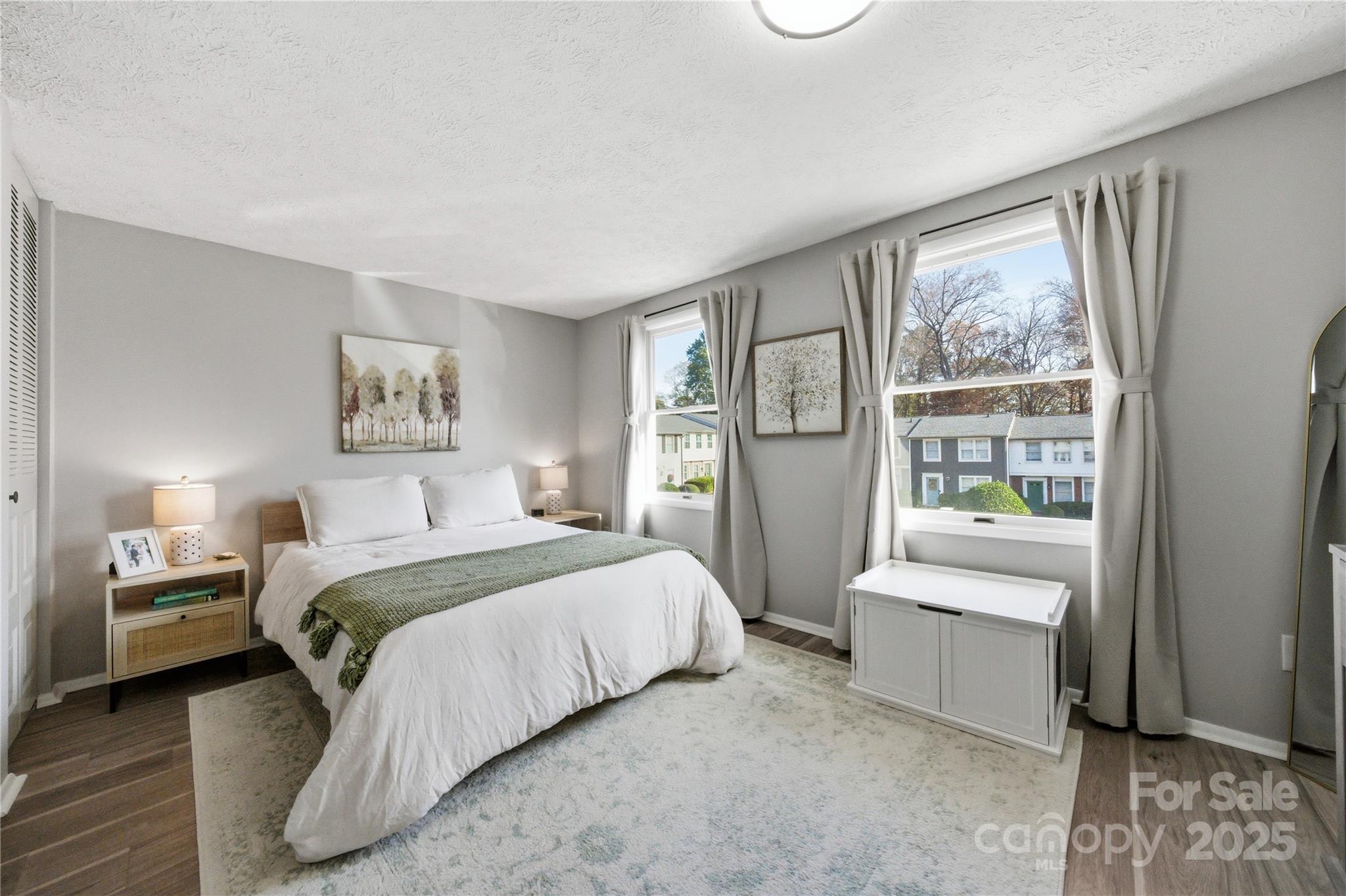 1235 Scaleybark Road, Unit C Charlotte, NC 28209 - Photo 16 of 33 a bedroom with a large bed and a window