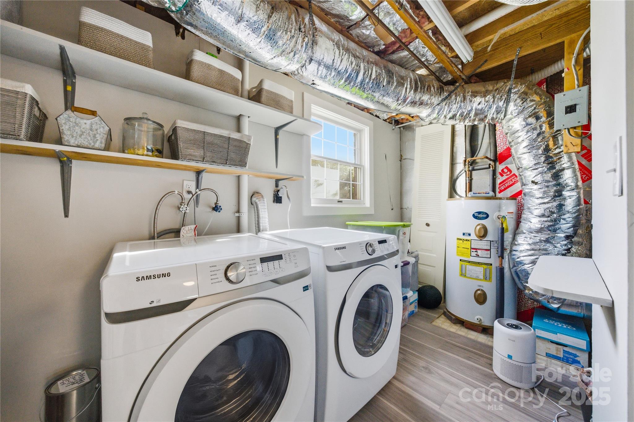 1235 Scaleybark Road, Unit C Charlotte, NC 28209 - Photo 25 of 33 a utility room with dryer and washer