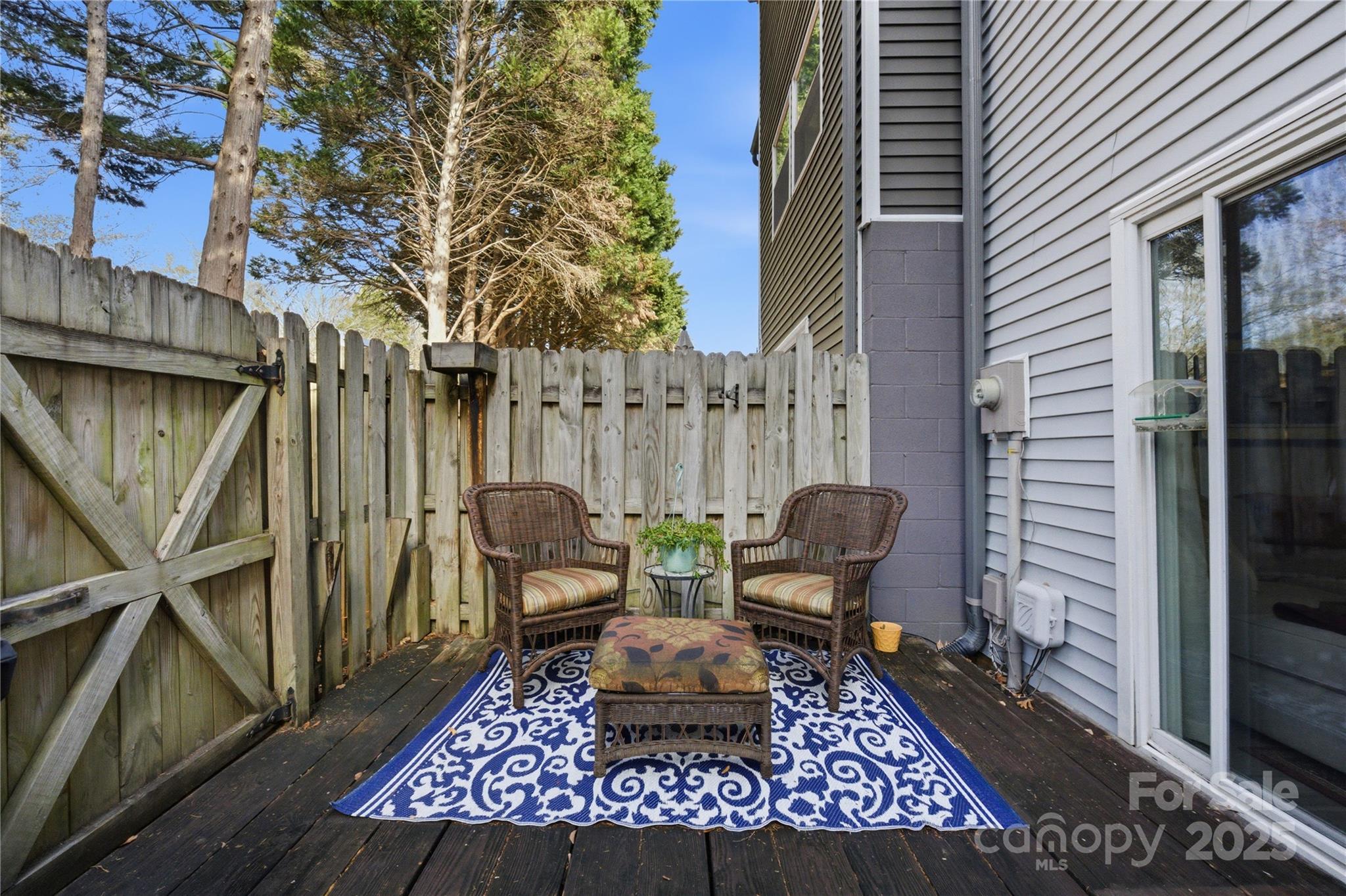 1235 Scaleybark Road, Unit C Charlotte, NC 28209 - Photo 26 of 33 a view of a patio with couple of chairs and a potted plant