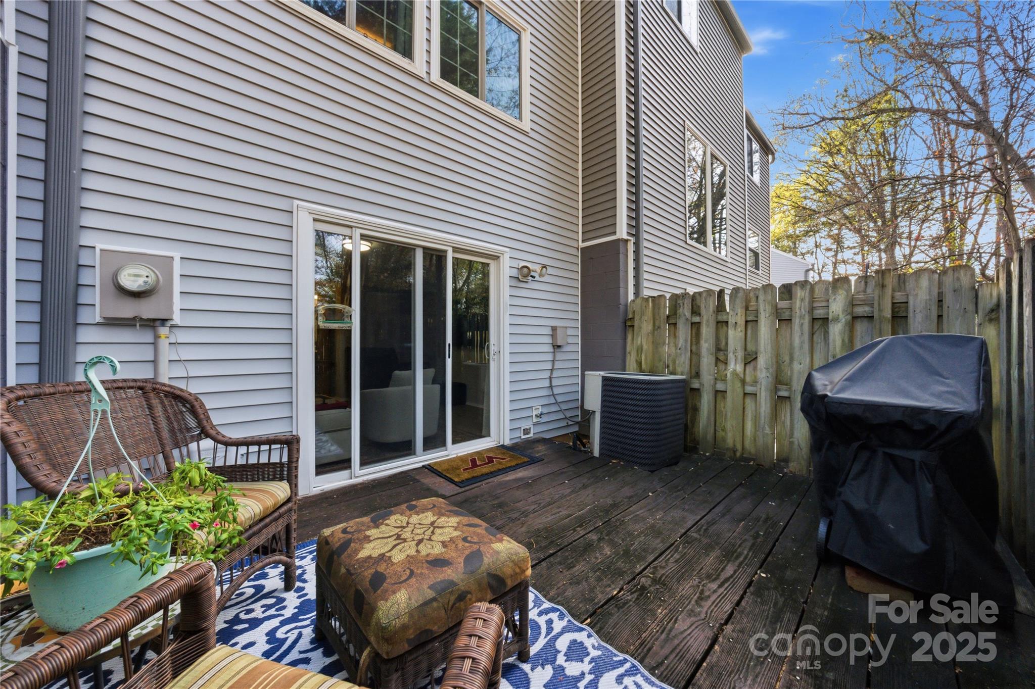 1235 Scaleybark Road, Unit C Charlotte, NC 28209 - Photo 27 of 33 a view of a chairs and table in backyard of the house