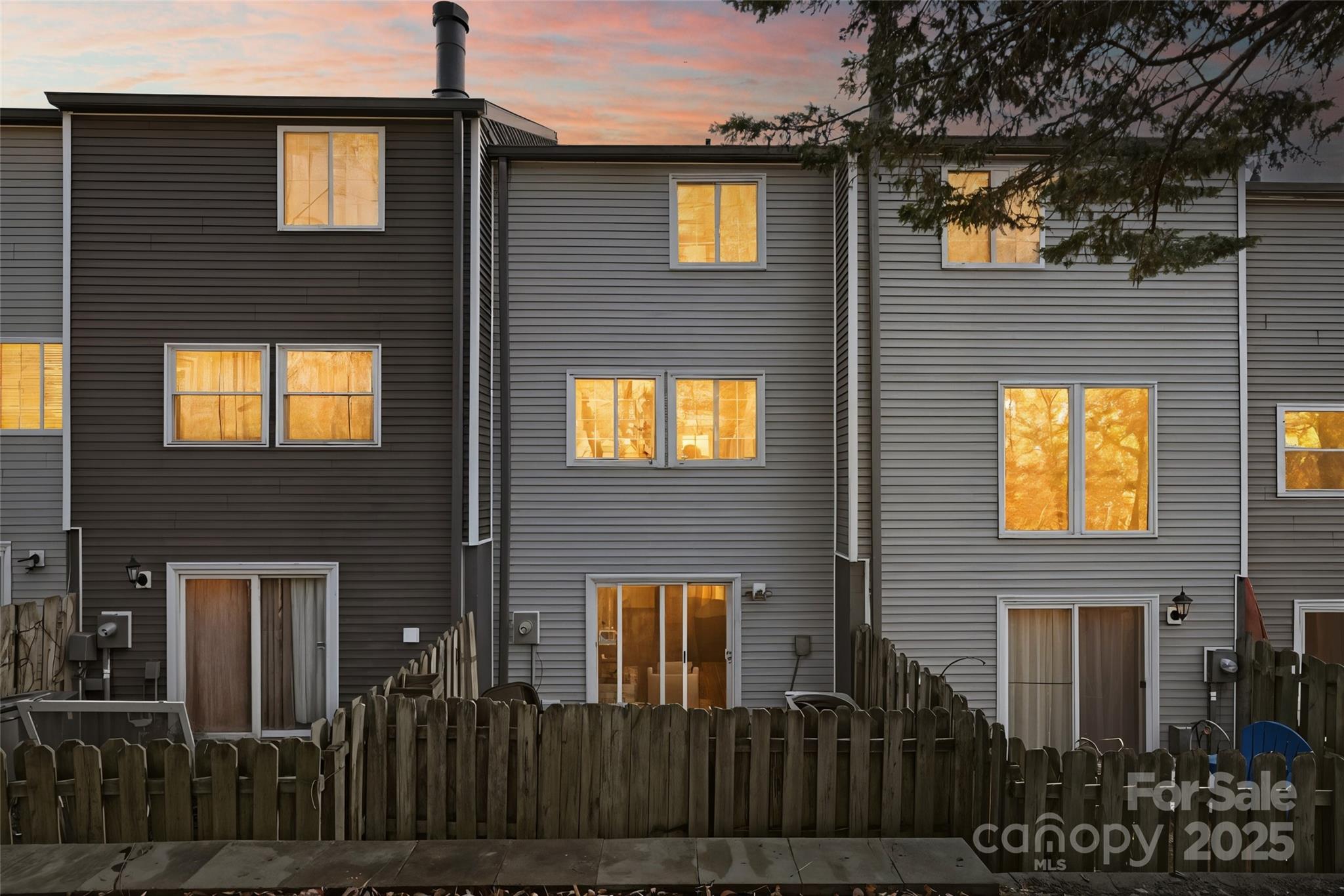 1235 Scaleybark Road, Unit C Charlotte, NC 28209 - Photo 28 of 33 a front view of a house with a yard