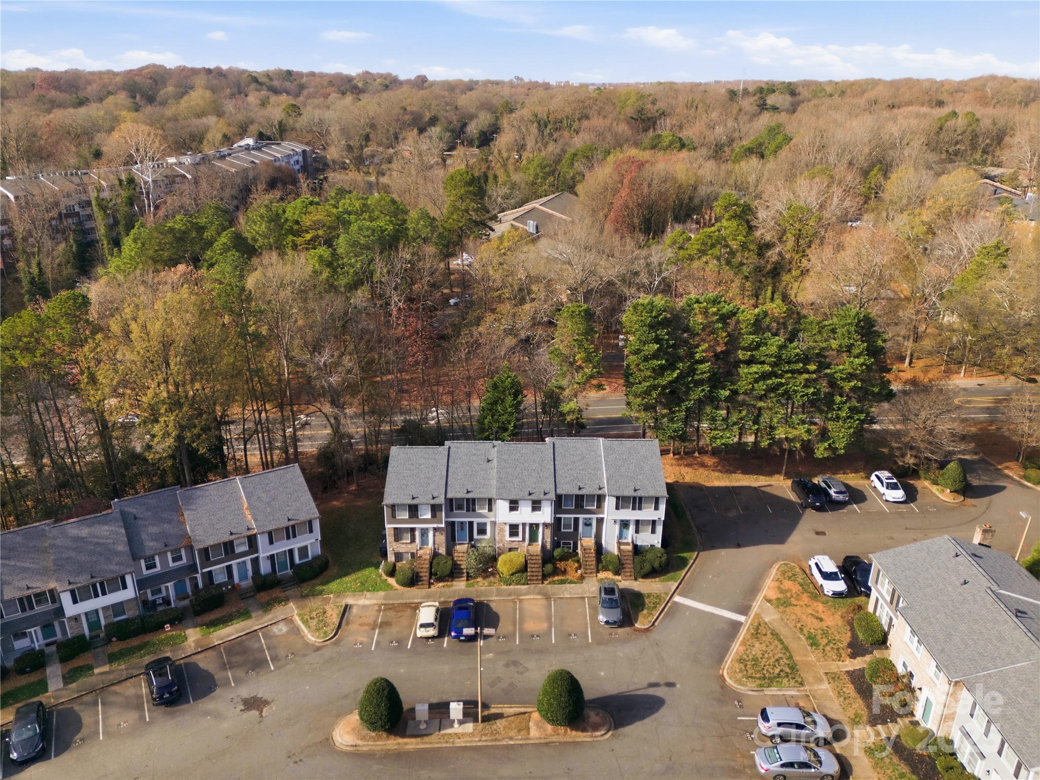1235 Scaleybark Road, Unit C Charlotte, NC 28209 - Photo 30 of 33 an aerial view of a swimming pool with a patio