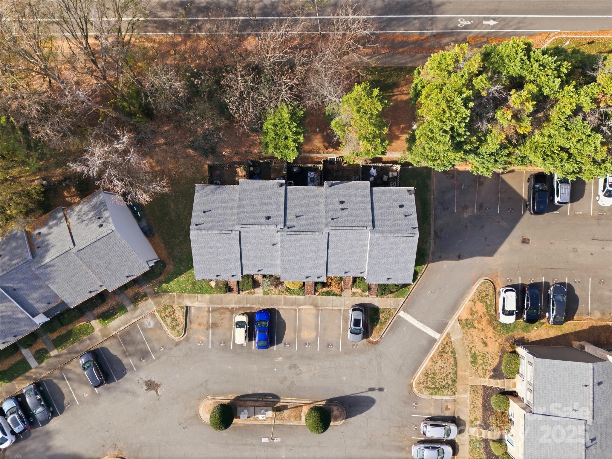 1235 Scaleybark Road, Unit C Charlotte, NC 28209 - Photo 31 of 33 an aerial view of residential houses with outdoor space