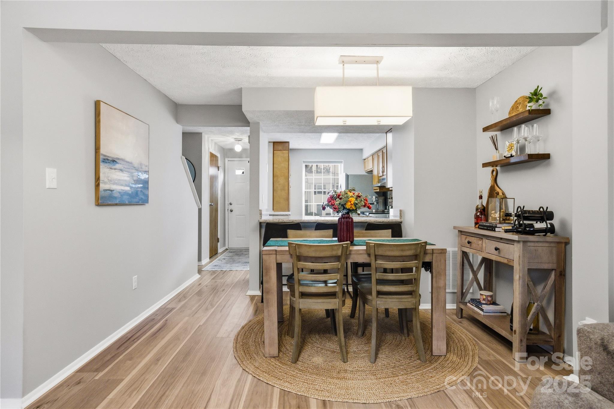 1235 Scaleybark Road, Unit C Charlotte, NC 28209 - Photo 8 of 33 a view of a dining room with furniture