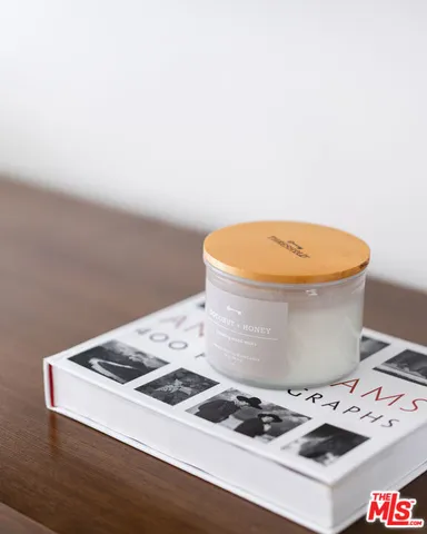 a kitchen with a stove and a white cabinet