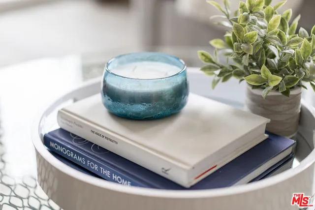 a vase of flowers sitting on a table