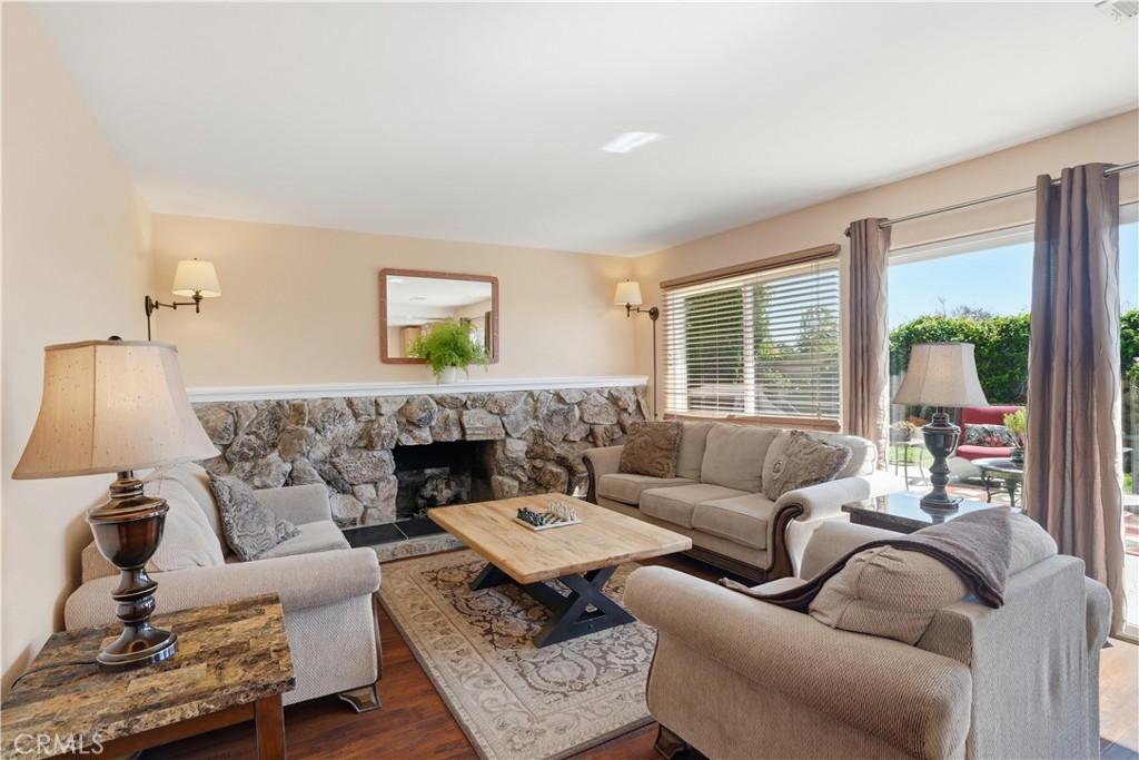 3330 Township Avenue Simi Valley, CA 93063 - Photo 13 of 40 a living room with furniture and a fireplace