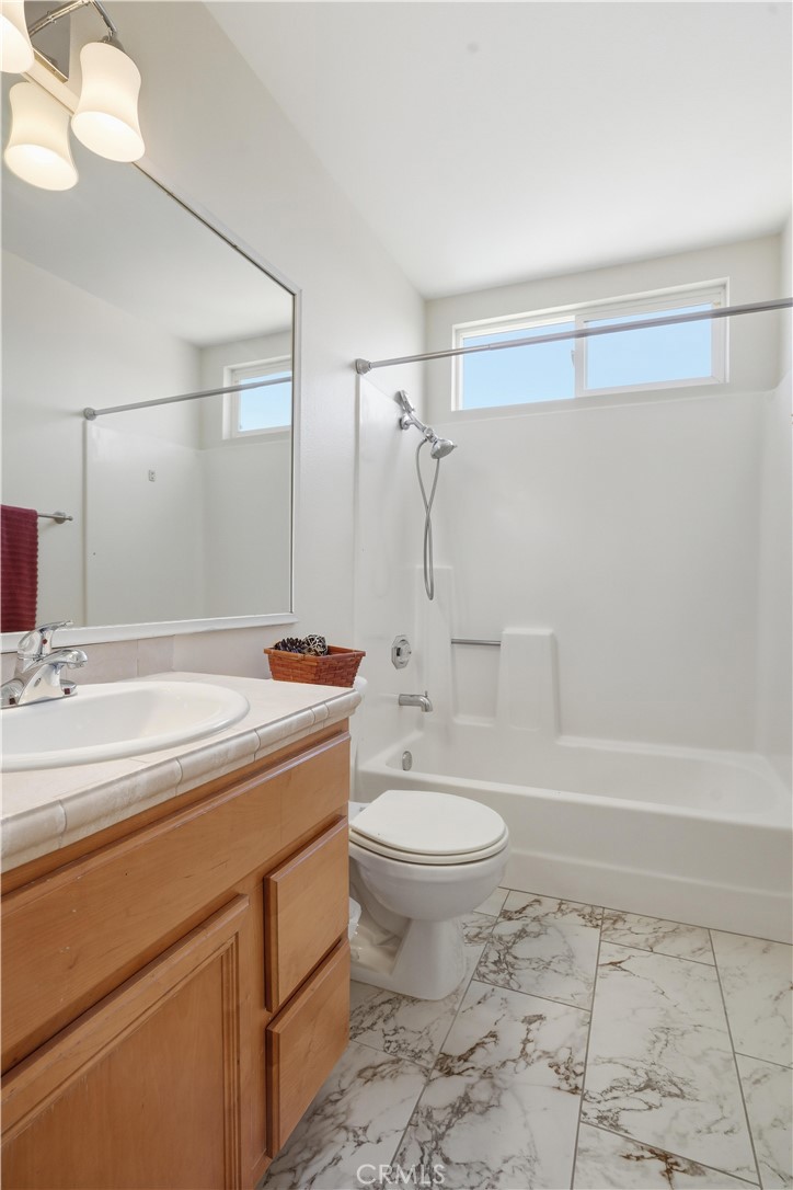 3330 Township Avenue Simi Valley, CA 93063 - Photo 25 of 40 a bathroom with a sink a toilet and shower