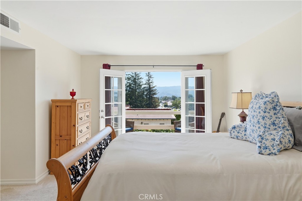 3330 Township Avenue Simi Valley, CA 93063 - Photo 27 of 40 a bedroom with a large bed and a large window