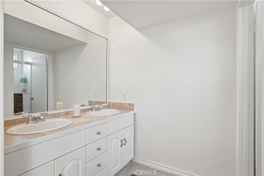 3330 Township Avenue Simi Valley, CA 93063 - Photo 31 of 40 a bathroom with a sink and a mirror