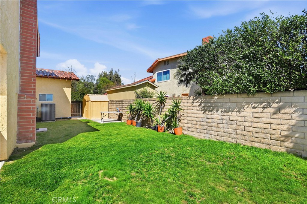 3330 Township Avenue Simi Valley, CA 93063 - Photo 34 of 40 a view of a house with a yard