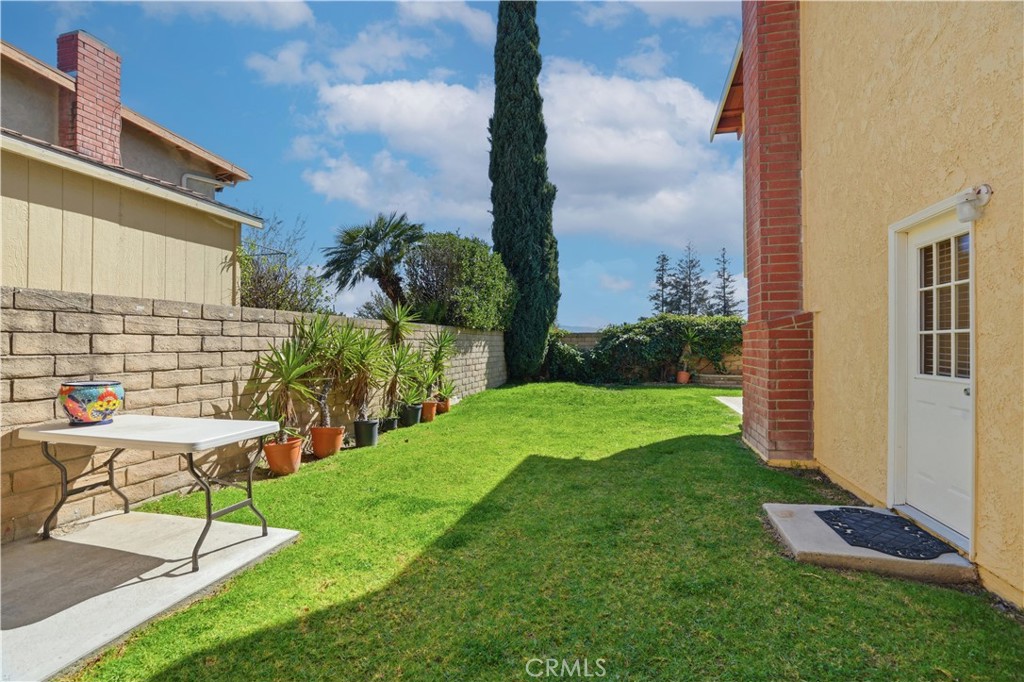 3330 Township Avenue Simi Valley, CA 93063 - Photo 35 of 40 a view of a chair and table in backyard of the house