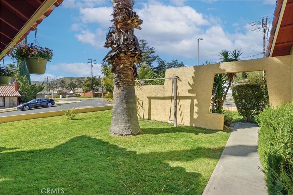 3330 Township Avenue Simi Valley, CA 93063 - Photo 4 of 40 a view of a house with a yard