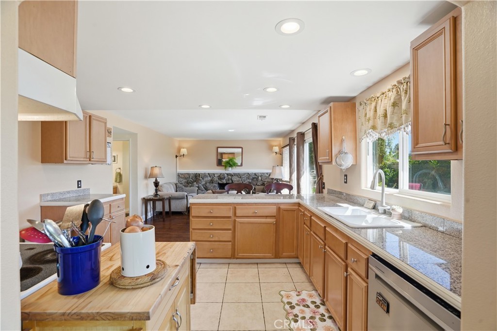 3330 Township Avenue Simi Valley, CA 93063 - Photo 10 of 40 a kitchen with a sink stove and cabinets