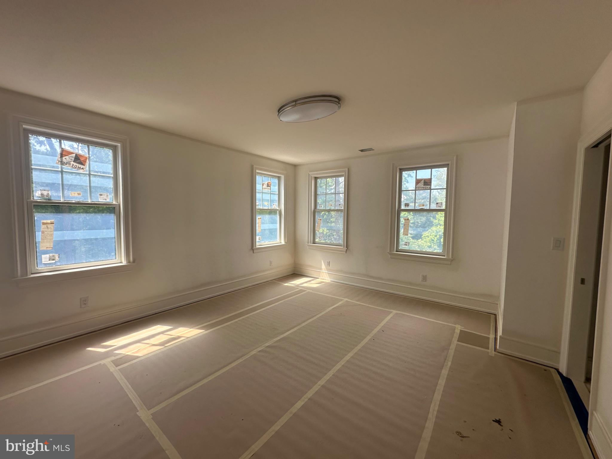 353 Oak Terrace Wayne, PA 19087 - Photo 8 of 13 a view of an empty room with windows