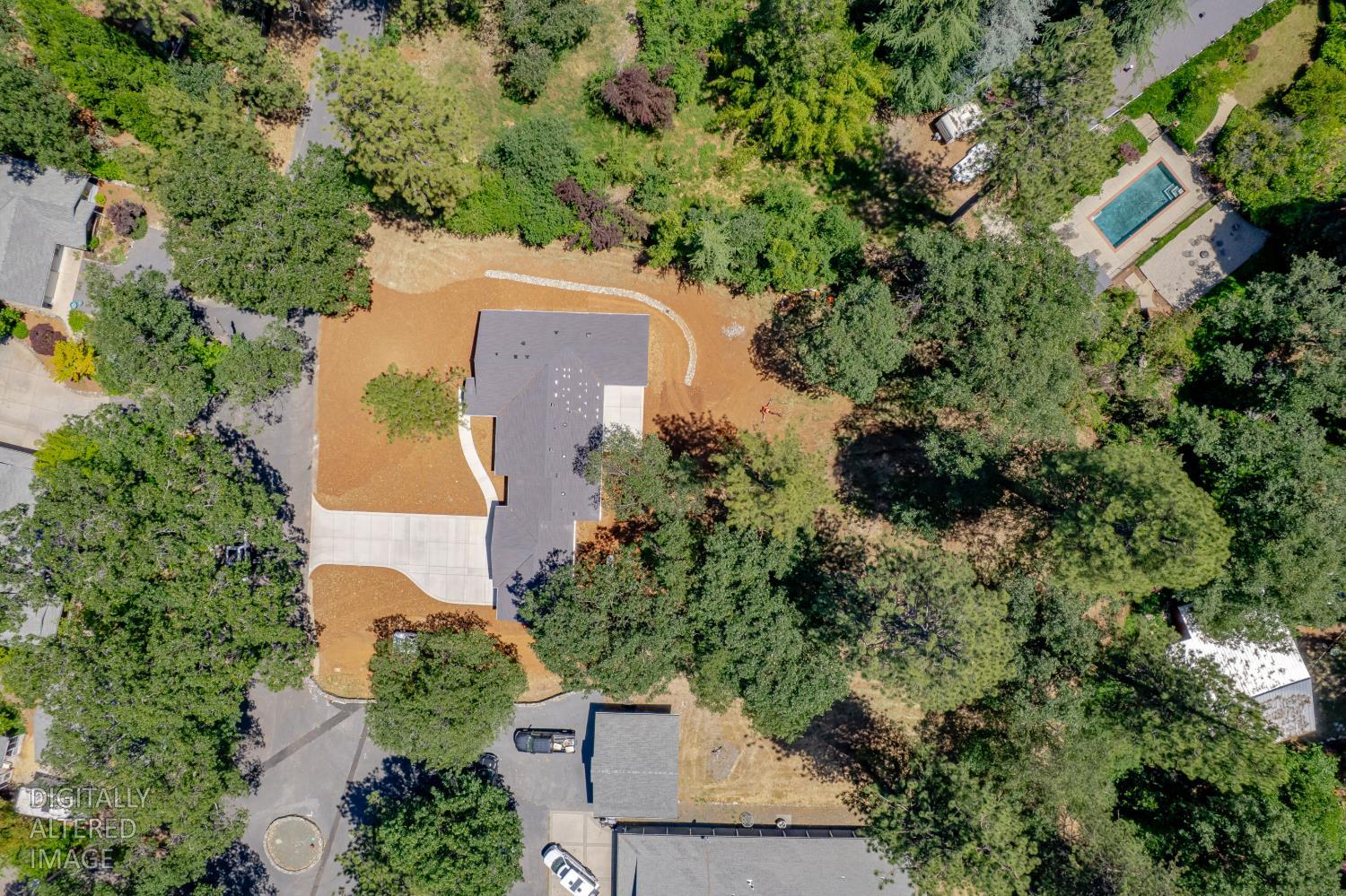 280 Jan Road Grass Valley, CA 95945 - Photo 44 of 66 an aerial view of a house with a yard and trees all around