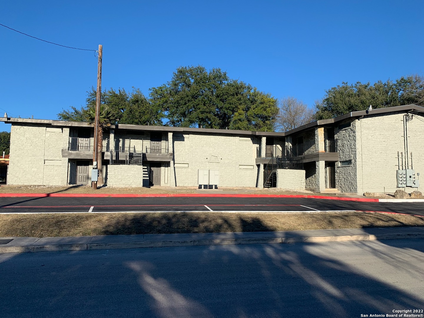 520 Gentleman Road, Unit 4 Balcones Heights, TX 78201 - Photo 12 of 13 a front view of a house with a garden