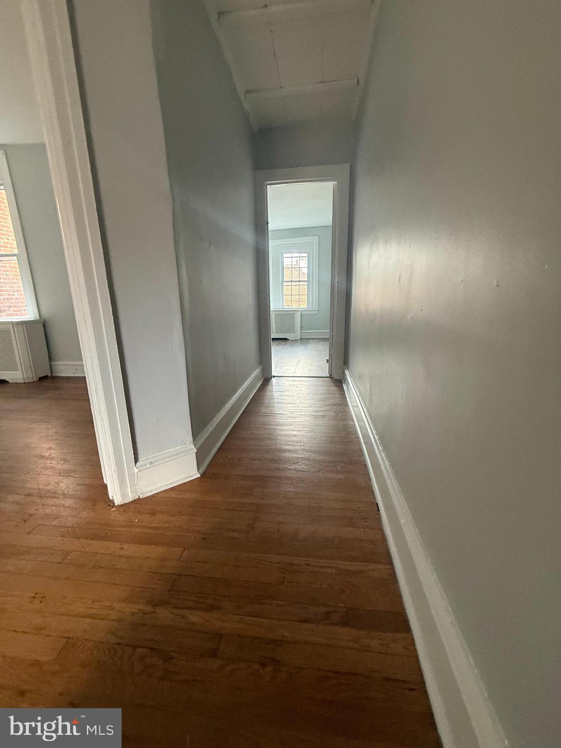 149 Springton Road Upper Darby, PA 19082 - Photo 13 of 31 a view of a hallway with wooden floor