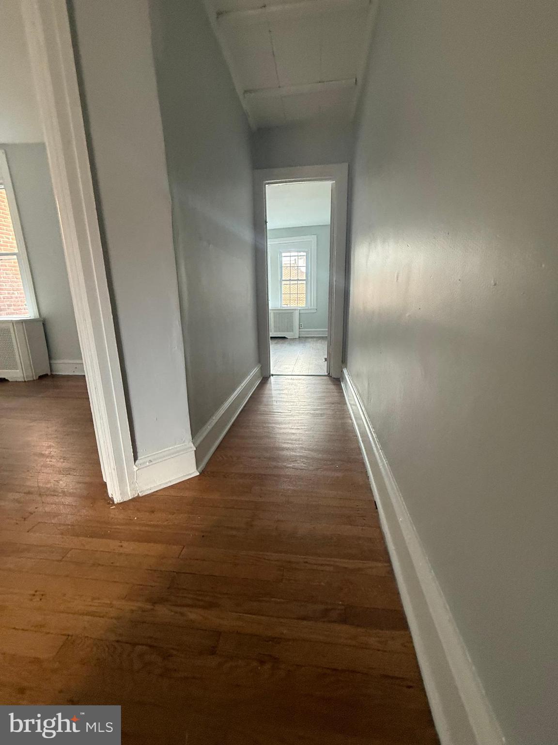 149 Springton Road Upper Darby, PA 19082 - Photo 18 of 31 a view of a hallway with wooden floor