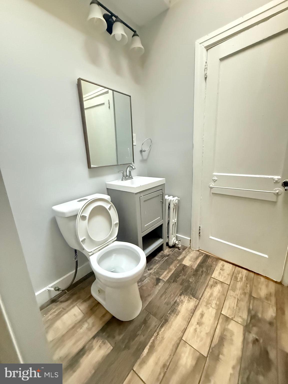 149 Springton Road Upper Darby, PA 19082 - Photo 20 of 31 a view of a bathroom with a sink and mirror
