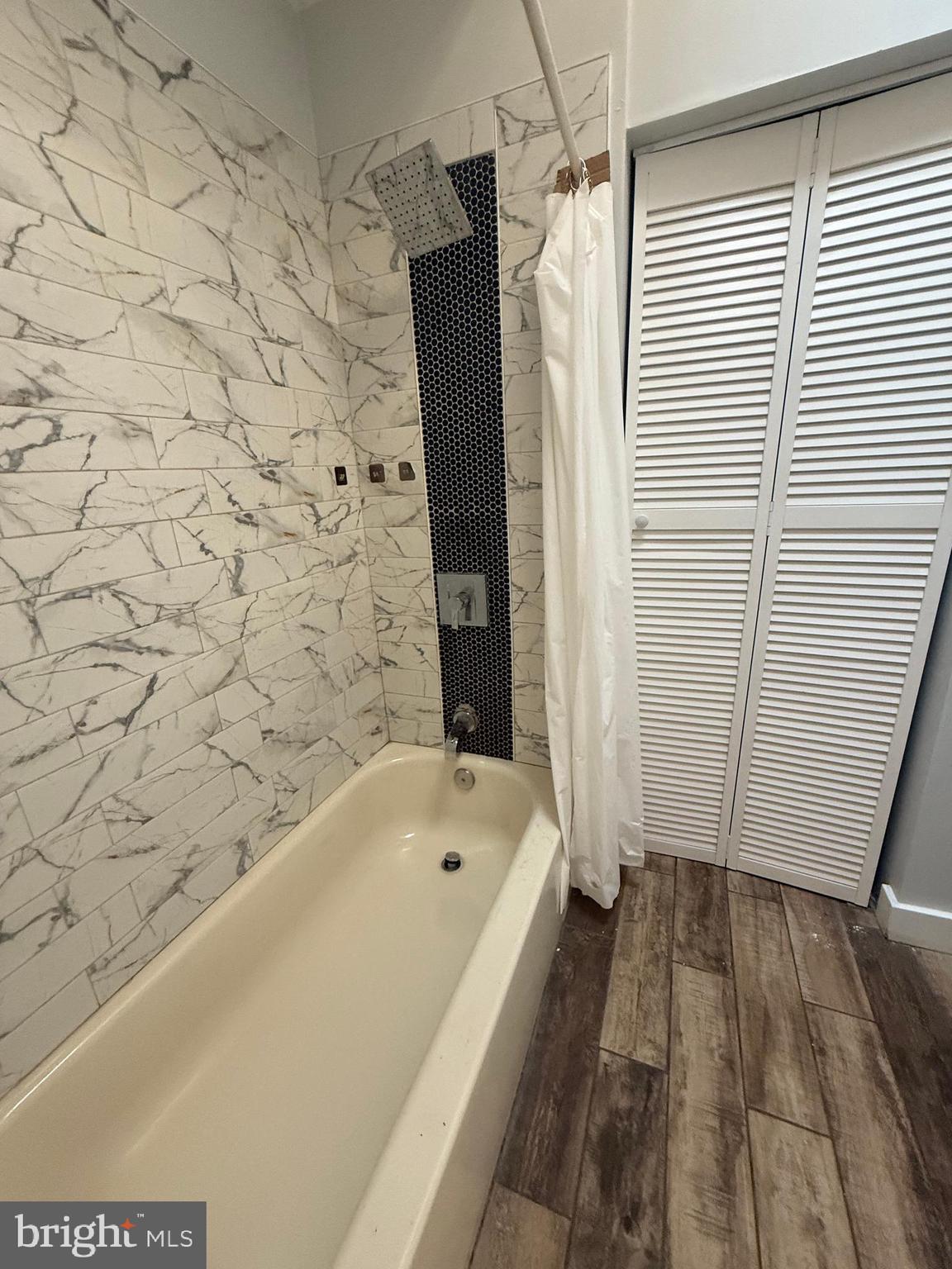149 Springton Road Upper Darby, PA 19082 - Photo 23 of 31 a bathroom with a bathtub and shower