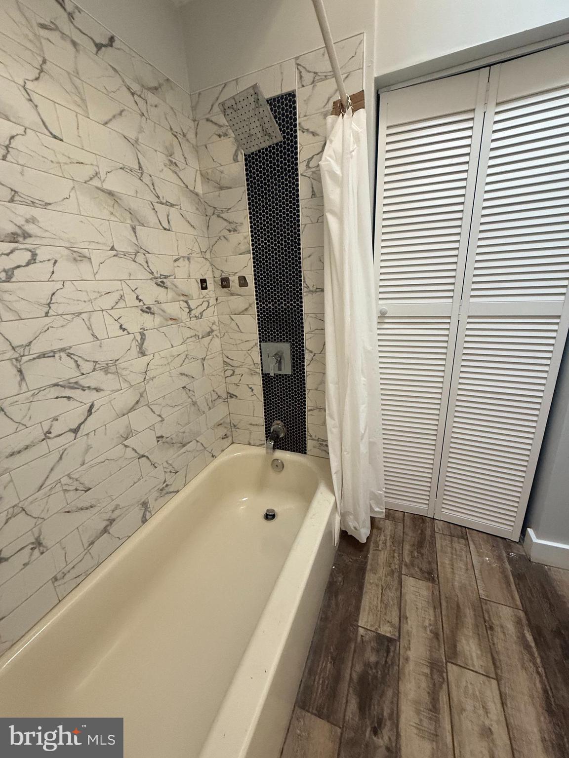 149 Springton Road Upper Darby, PA 19082 - Photo 6 of 31 a bathroom with a bathtub and shower