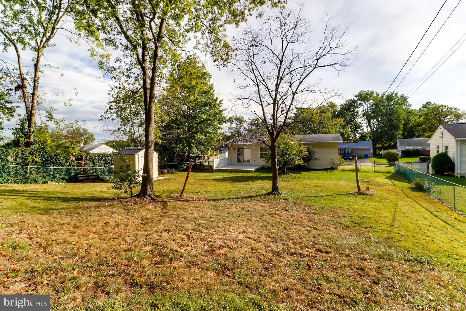 2008 Hanson Road Edgewood, MD 21040 - Photo 6 of 28 a view of swimming pool with lawn chairs and large trees