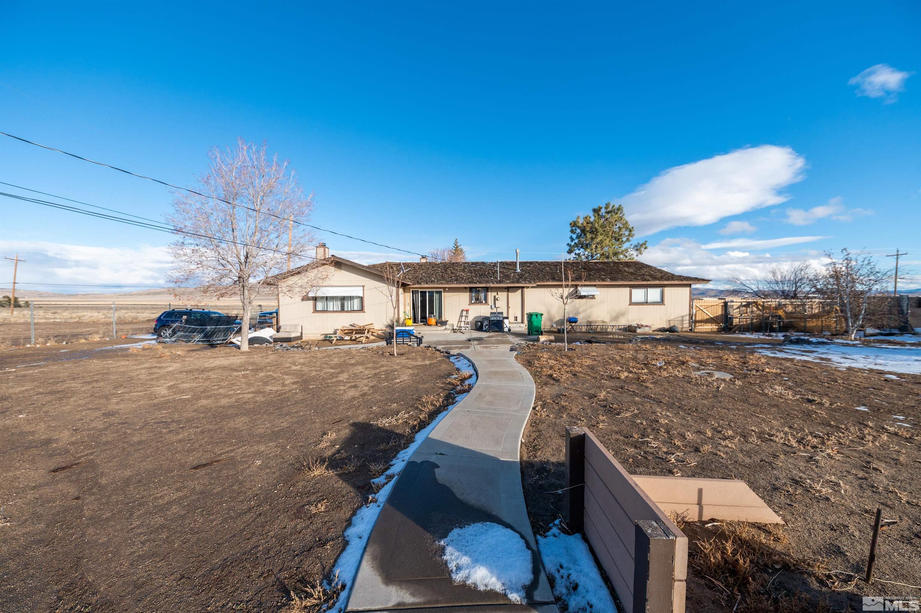 11775 Osage Road Reno, NV 89508 - Photo 4 of 31 a view of house with a yard