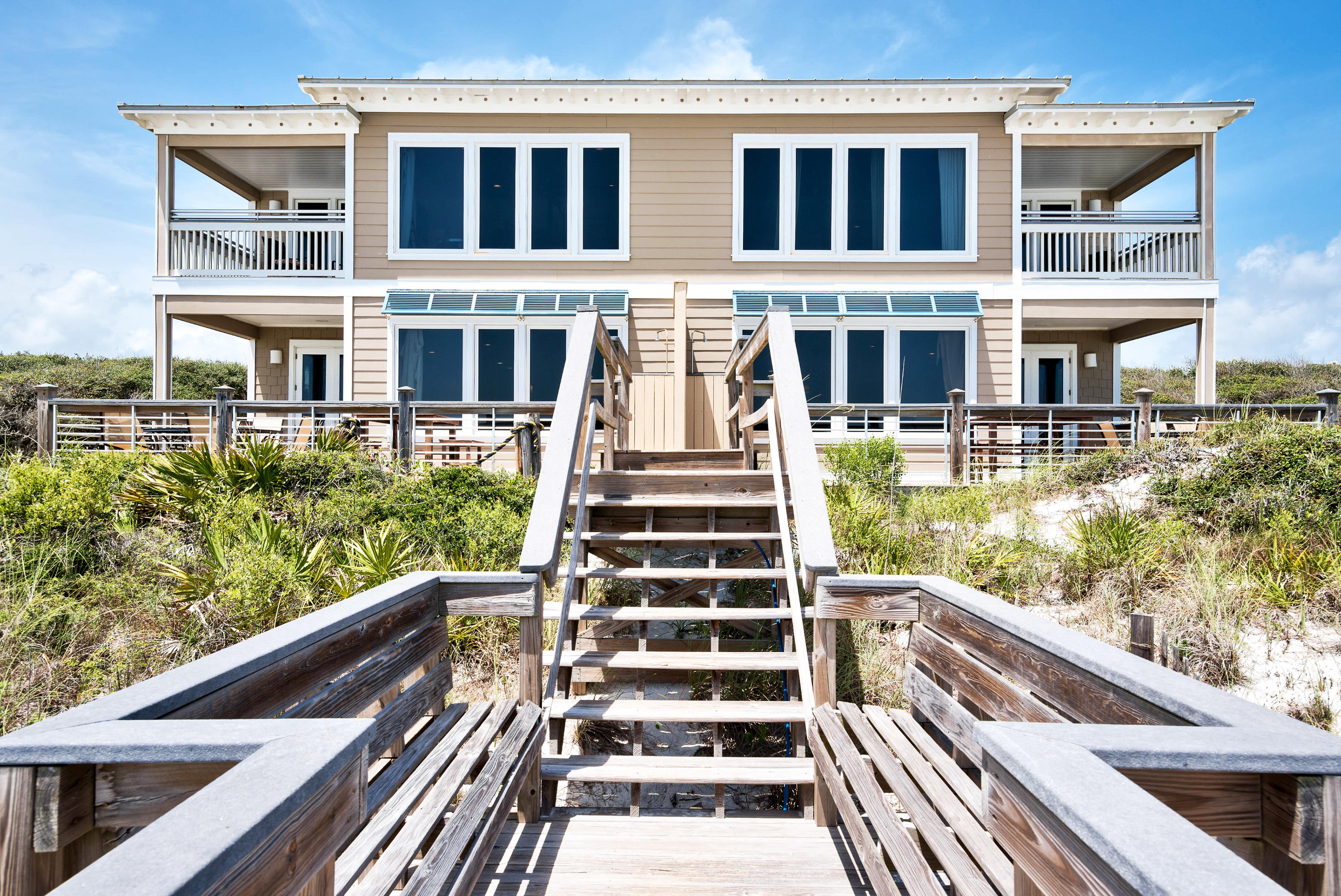 179 Pelican Circle Seacrest, FL 32461 - Photo 2 of 94 a view of a large building from a balcony